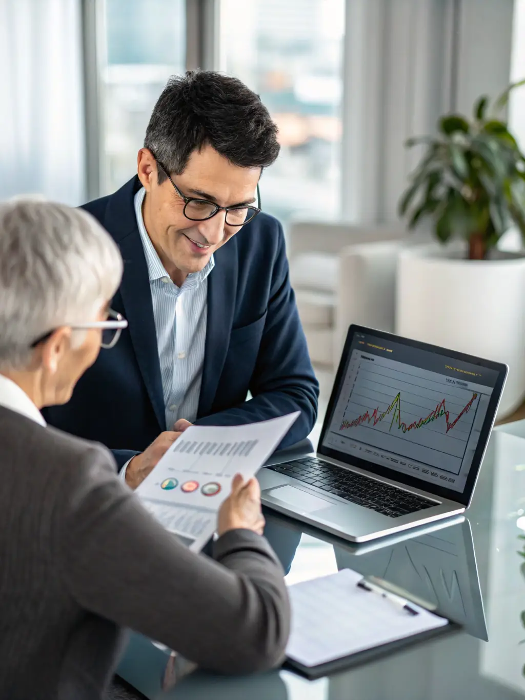 A professional financial advisor analyzing investment charts on a digital tablet, showcasing expertise in investment strategies.